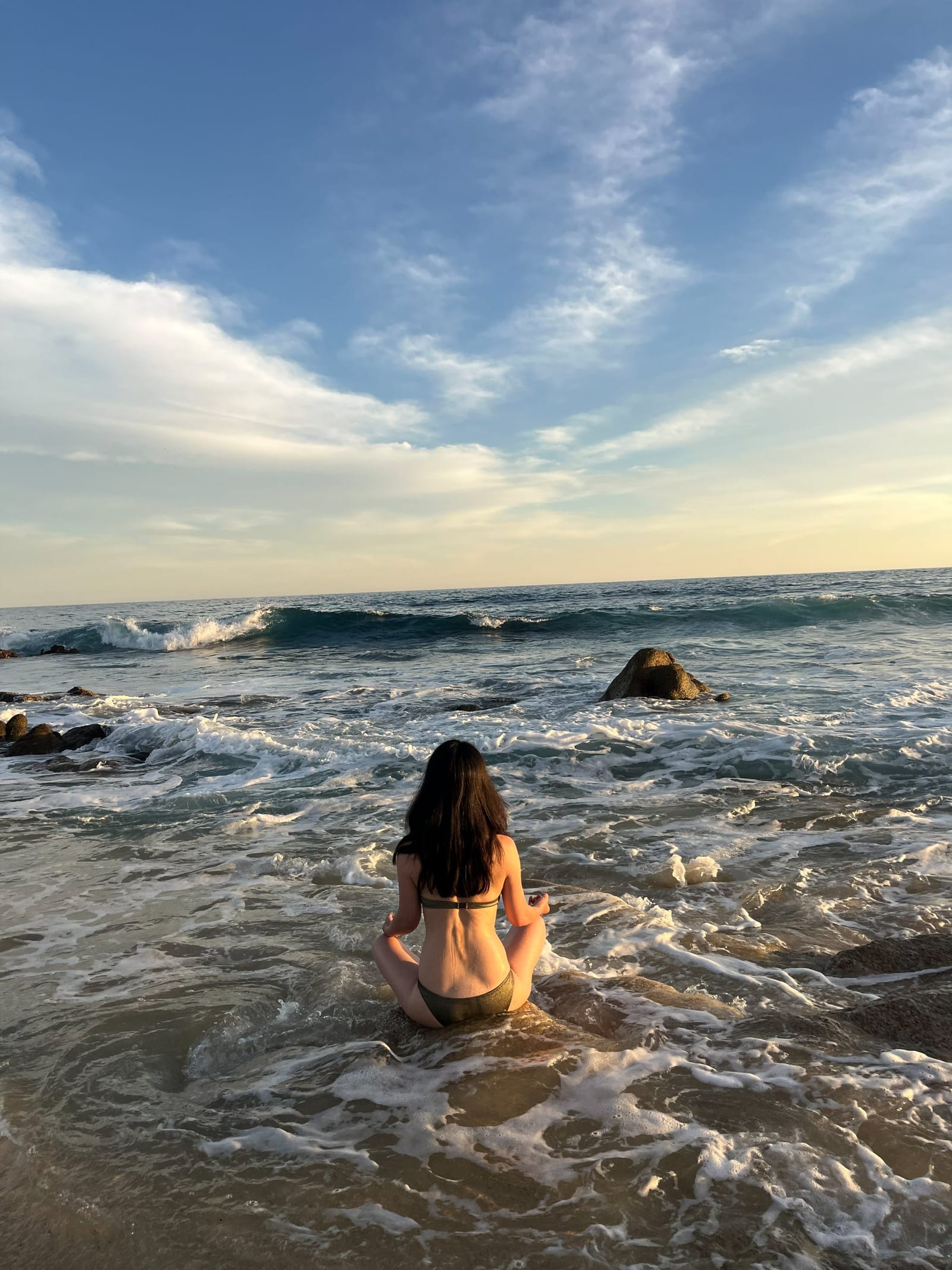 Duanni Hurd meditating in the ocean